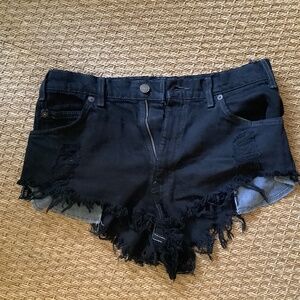 Levi’s cut off black jean shorts.  Size 32